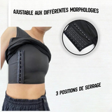 Personne portant un binder débardeur intégré, dévoilant la bande de crochets latérale.