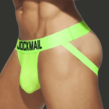 Jockstrap gay fluo vert avec maintien frontal et lanières arrière, vue de trois-quarts sur mannequin